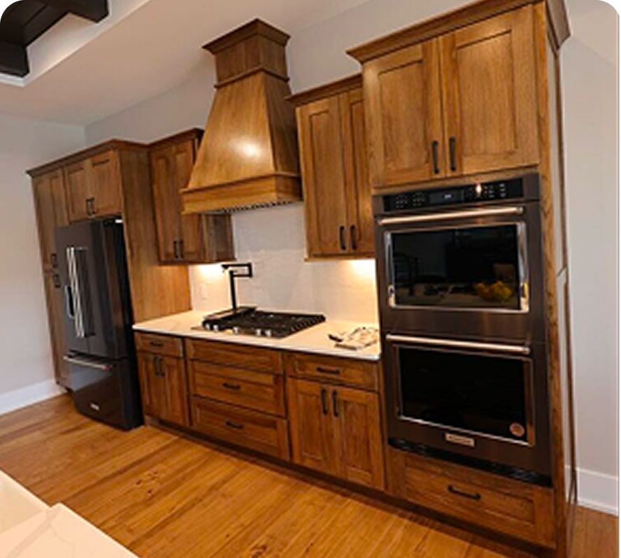 Handcrafted custom wood range hood in a modern kitchen
